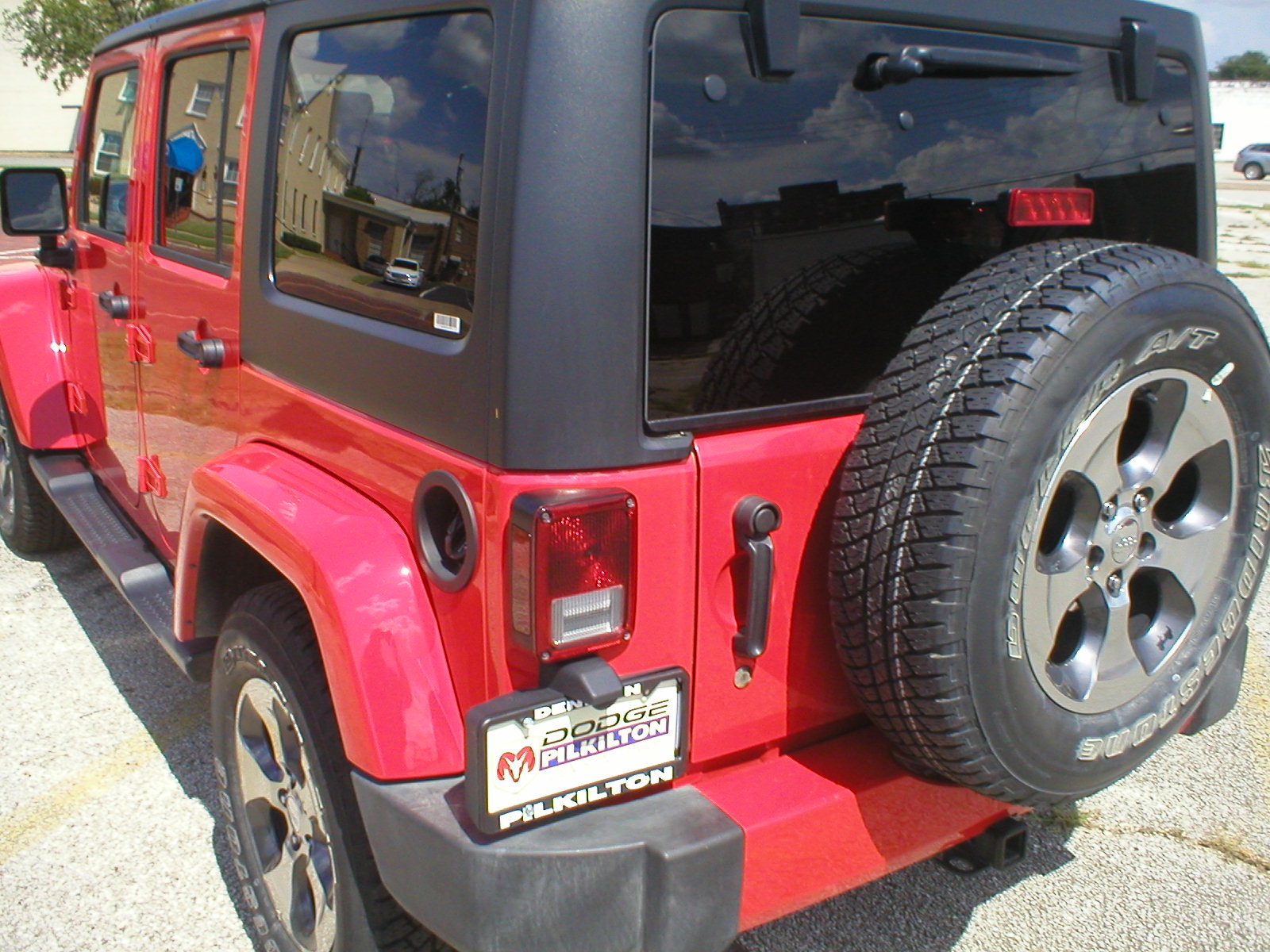 2016 Jeep Wrangler Unlimited Sahara 4X4 4-Door-Firecracker Red - Fred Pilkilton Motors - Denison Texas