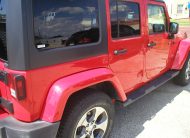 2016 Jeep Wrangler Unlimited Sahara 4X4 4-Door-Firecracker Red - Fred Pilkilton Motors - Denison Texas