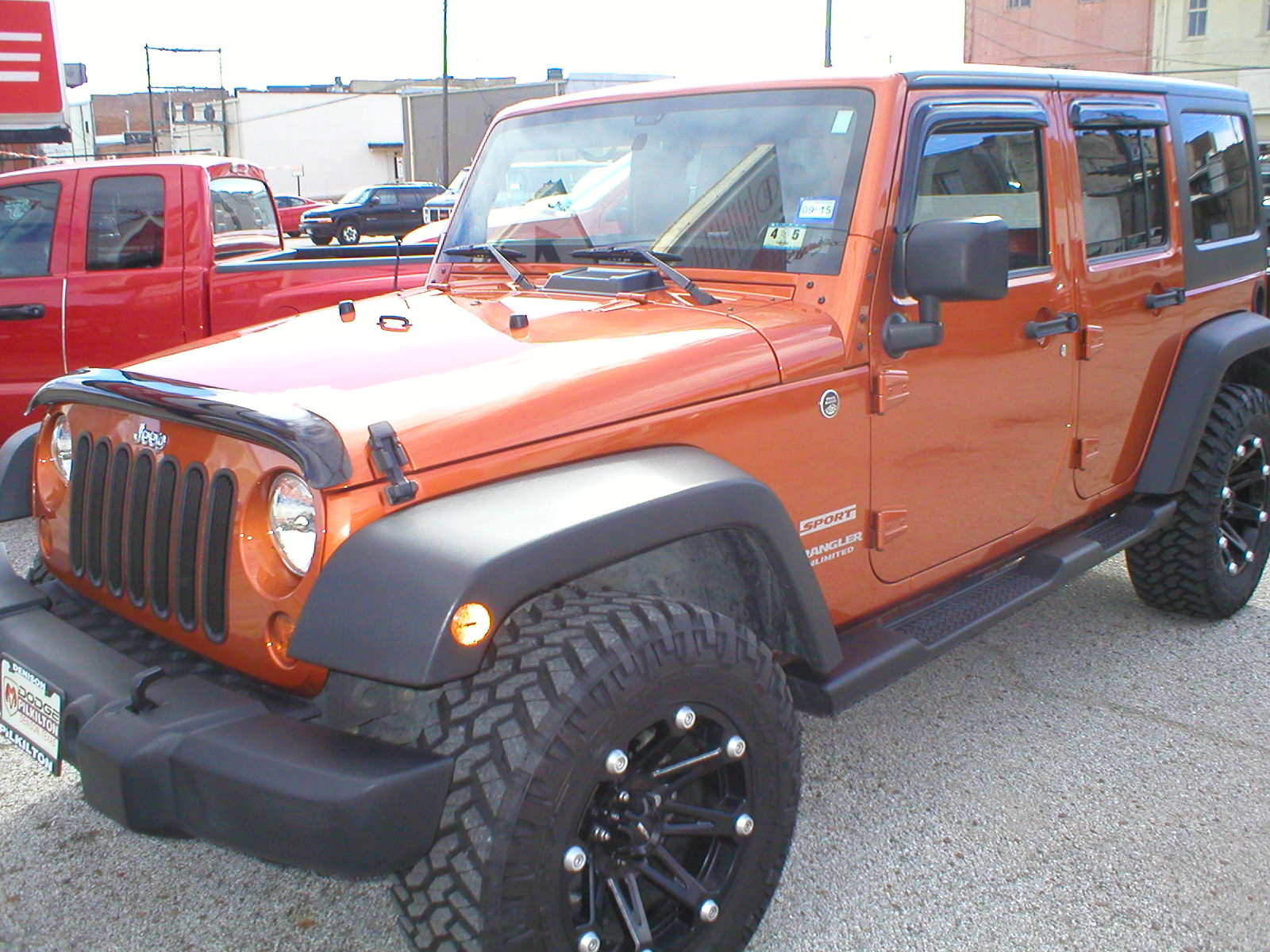 2011 Jeep Wrangler Unlimited Sport S 4-Door 4x4 Copper Pearl - Fred Pilkilton Motors - Denison Texas