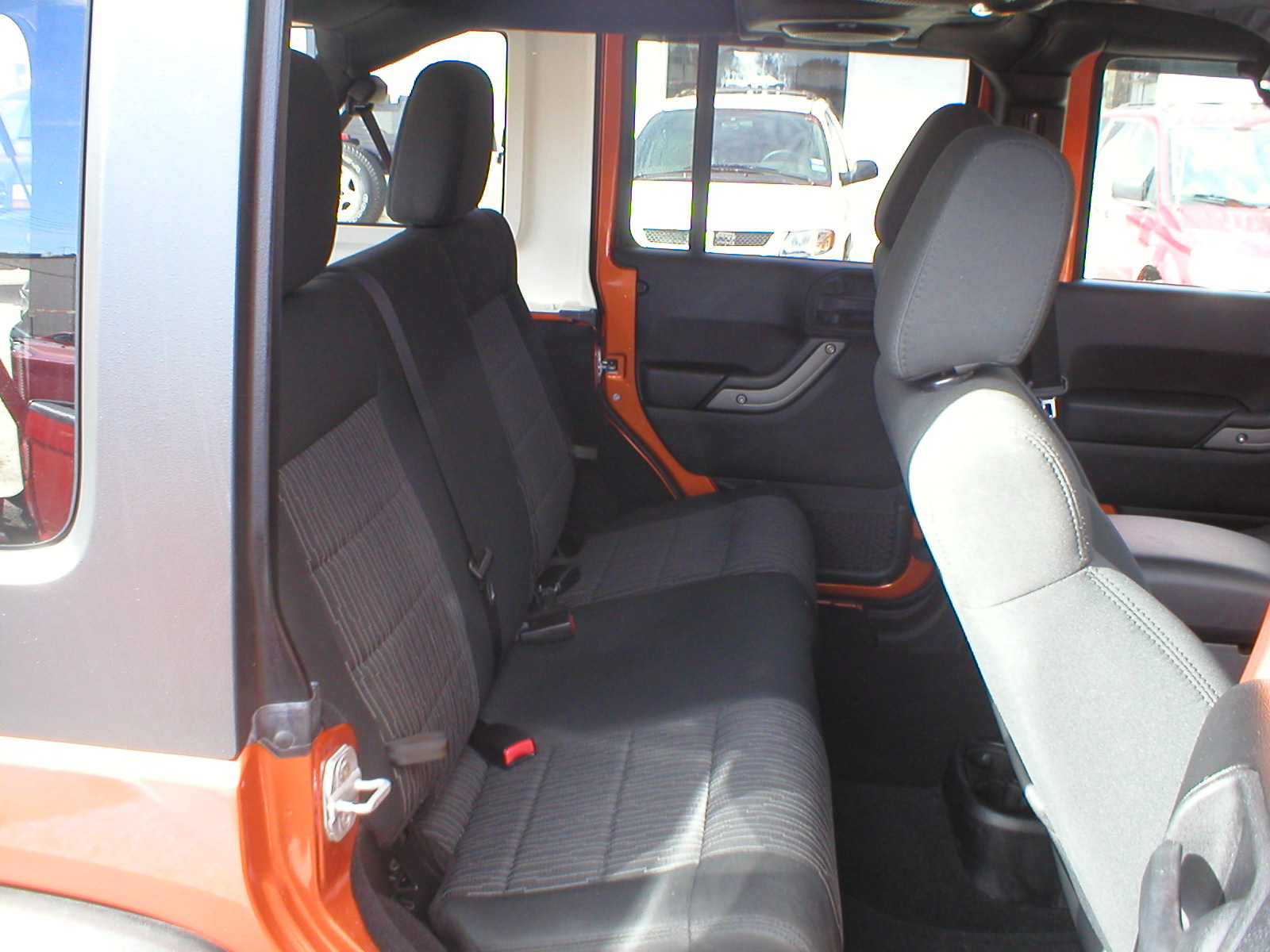 2011 Jeep Wrangler Unlimited Sport S 4-Door 4x4 Copper Pearl - Fred Pilkilton Motors - Denison Texas