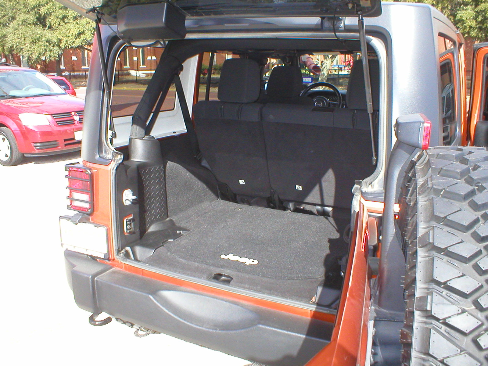 2011 Jeep Wrangler Unlimited Sport S 4-Door 4x4 Copper Pearl - Fred Pilkilton Motors - Denison Texas