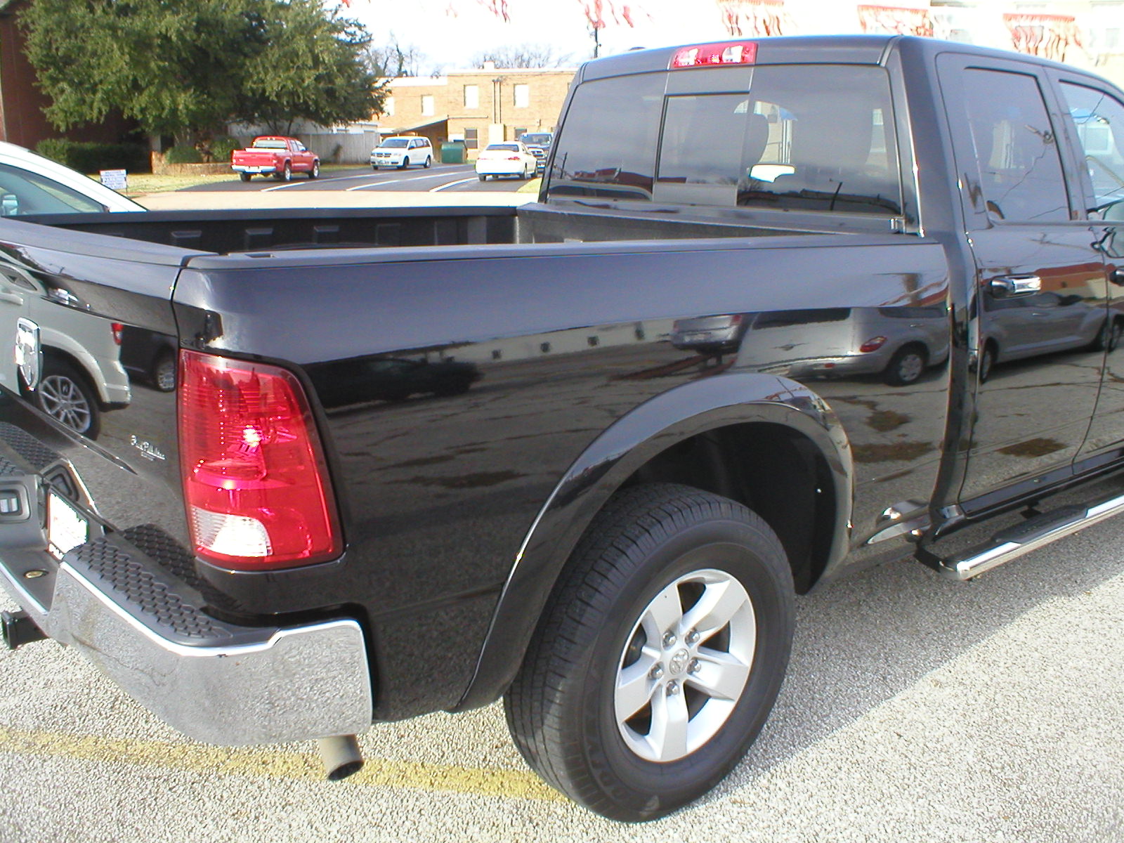 2014 Dodge Ram 1500 Quad Cab SLT 4-Door Black - Fred Pilkilton Motors - Denison Texas