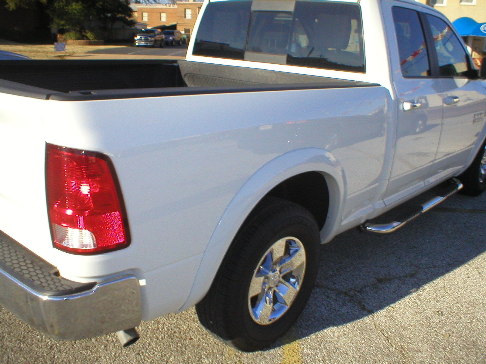 2016 Dodge Ram 1500 SLT Quad Cab 4-Door Pickup White
