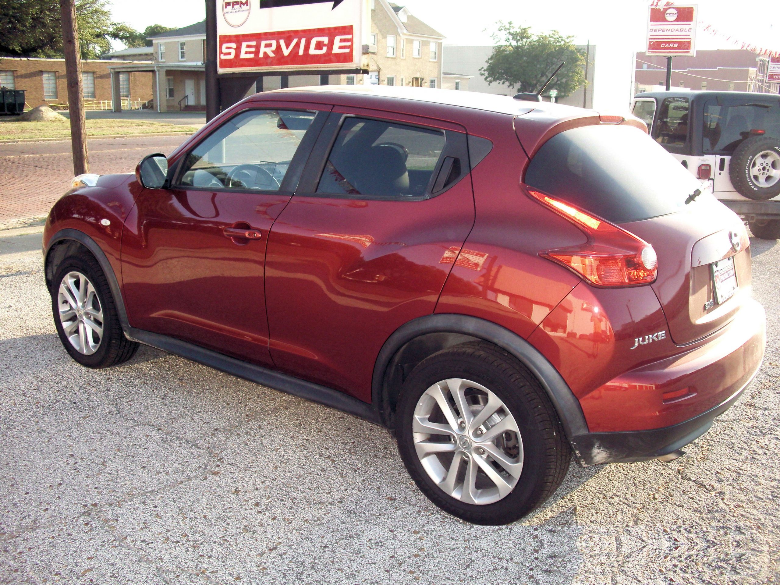 2012 Nissan Juke SL AWD Maroon - Fred Pilkilton Motors - Denison Texas